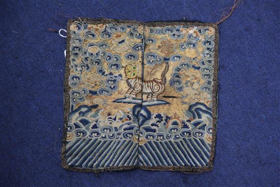 A group of Chinese late Qing dynasty embroidered panels including a Mandarin square